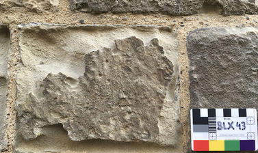 Reigate Stone with sulphation at the Bell Tower, Tower of London
